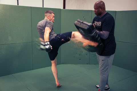 A photo of Barry Robinson training World Class Fighters in MMA Striking