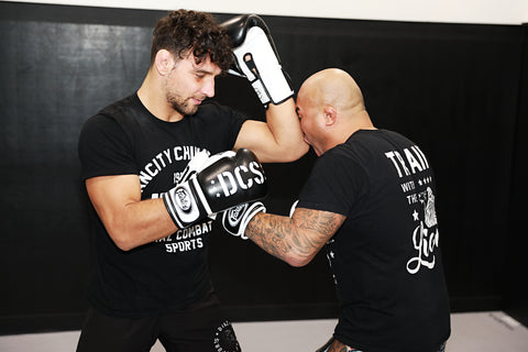 A photo of Ryan Diaz showing an elbow from his MMA Striking Drills volume