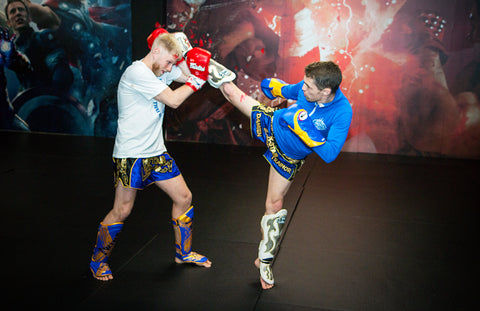 A photo of Damien Trainor demonstrating a technique from his Muay Thai Instructional The Fight Game Strategies for World Class Striking
