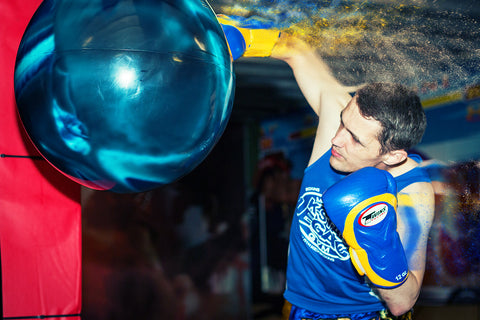 A photo of Damien Trainor Solo Training doing Bag Work on the Aqua Bag