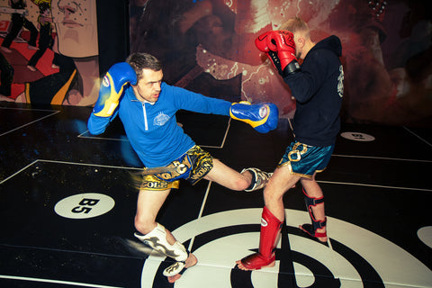 A photo of Damien Trainor demonstrating Muay Thai Sparring