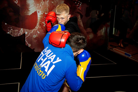 A photo of Damien Trainor demonstrating Muay Thai Sparring