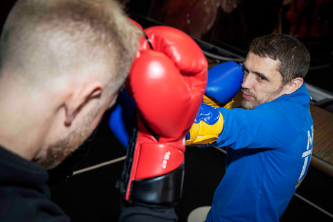 A photo of Damien Trainor demonstrating Muay Thai Sparring