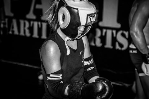 A photo of a female fighter from the blog post about Mental Skills Training for Fighters in Martial Arts and Combat Sports