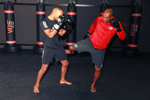 A photo of Ivan Hippolyte using the Vos Gym Kickboxing System in Training