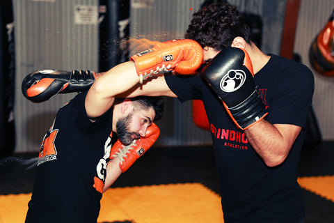 A photo of Jay Jauncey demonstrating how to fight taller opponents in Kickboxing Training