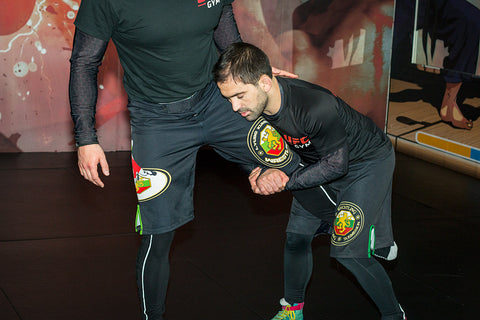A photo of Lyubo Kumbarov demonstrating advanced wrestling for BJJ & MMA