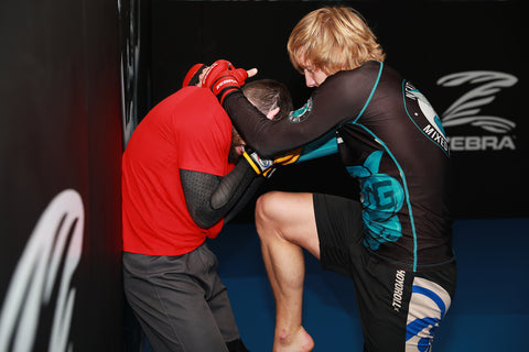 A photo of Paddy Pimblett demonstrating techniques from the High Percentage MMA - Next Generation MMA Fighting System with Paul Rimmer and Ellis Hampson