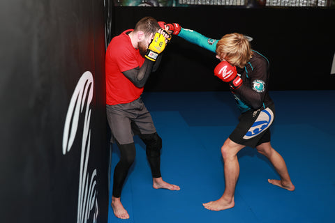 A graphic of Paddy Pimblett demonstrating techniques from the High Percentage MMA - Next Generation MMA Fighting System with Paul Rimmer and Ellis Hampson