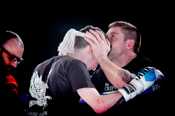 A photo of two fighters from the blog post exploring the psychology of winning fights in Martial arts and Combat Sports