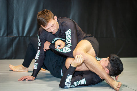 A photo of Stuart Cooper as he showcases his BJJ Pressure Passing System whilst Killing Guard