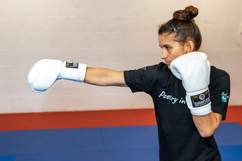 A photo of Tiffany van Soest punching as she trains Kickboxing Footwork and Agility