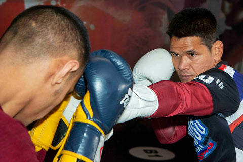 A photo of Yoddecha Sityodtong showcasing Muay Thai Drills from his Camp Training Beginner to Fighter volume