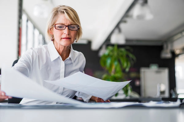 Woman busy with paperwork