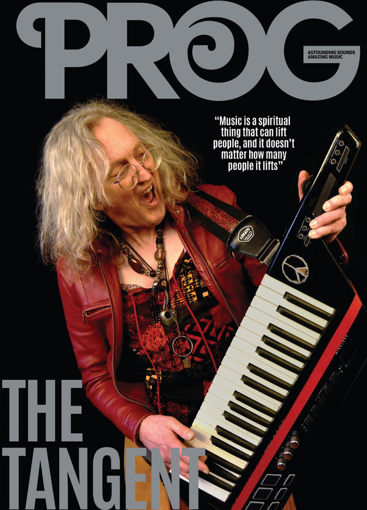 Andy on the front cover of Prog magazine, playing a piano guitar.