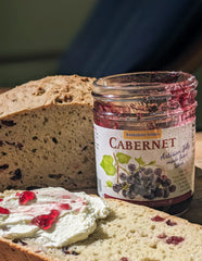 A slice of Irish Soda Bread, with a schmear of Cream Cheese and dabs of Cabernet Wine Jelly