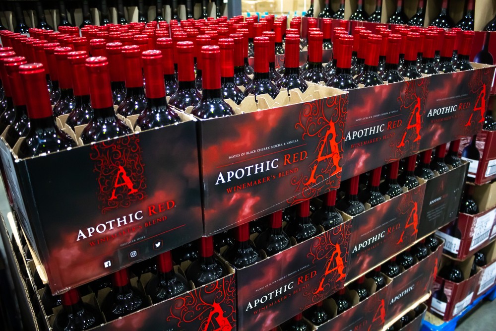 stacks of Apothic Red in a grocery store wine department