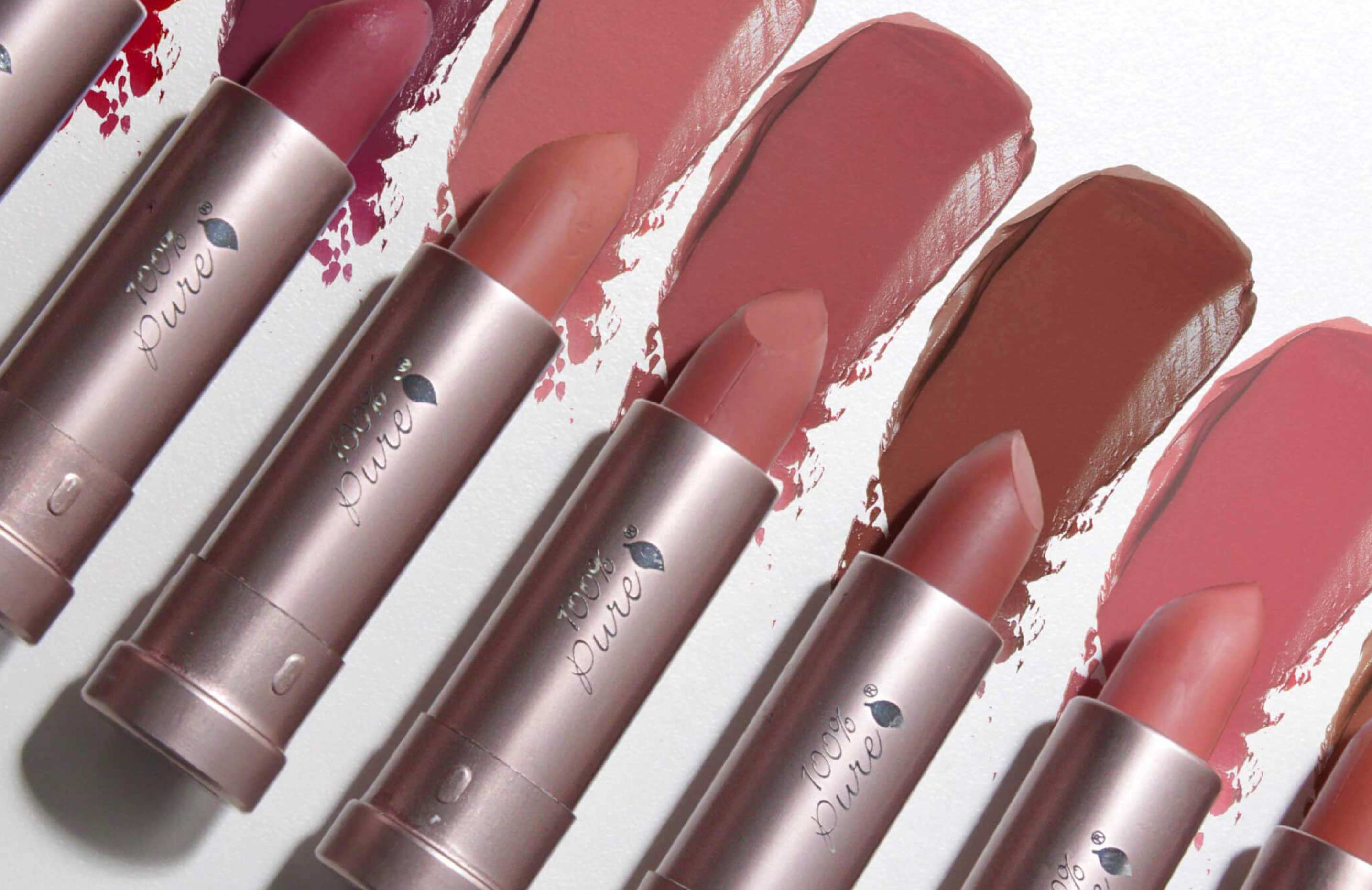 A lineup of 100% Pure lipsticks.
