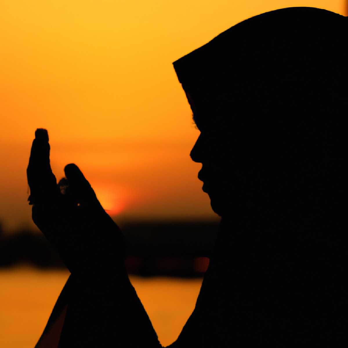 Woman making dua for breaking fast in Ramadan