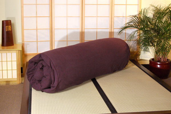 Rolled up Japanese Shiki Mat on Raku Tatami Platform Bed