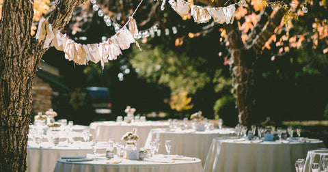 outdoor party with tables and chairs