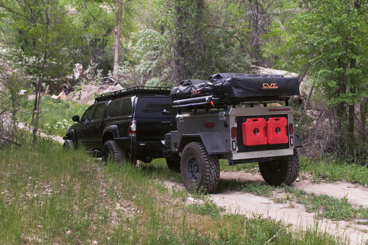 4WD SUV towing overland trailer with axle-less suspension