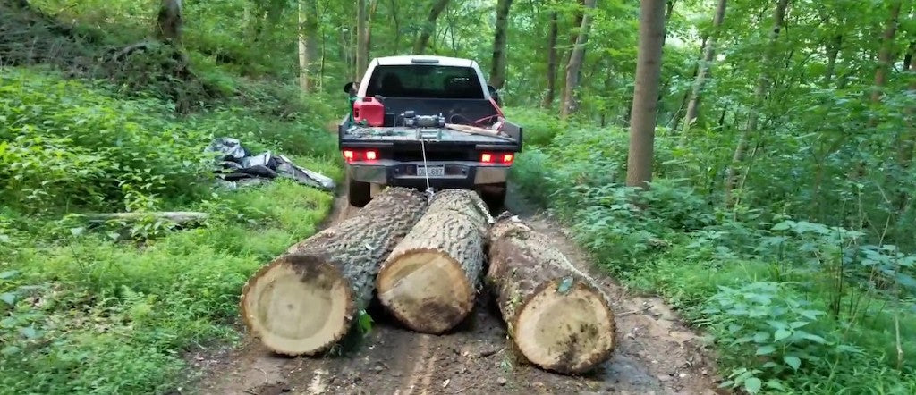 heavy duty pickup truck skidding logs in BC