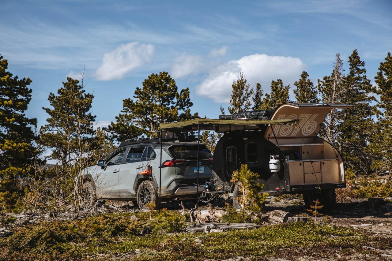 Toyota 4Runner towing overland trailer with axle-less suspension