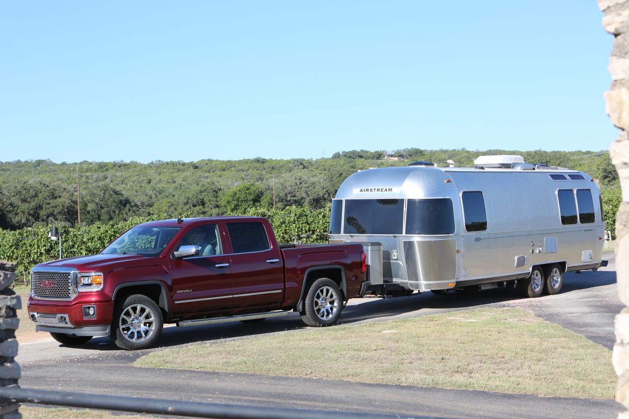 red truck towing camper