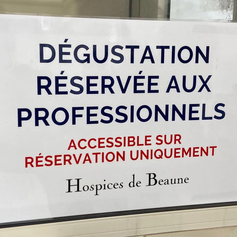 A sign in French indicating "Tasting reserved for professionals"