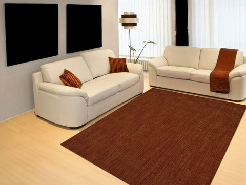 A classy living room with a brown sisal rug