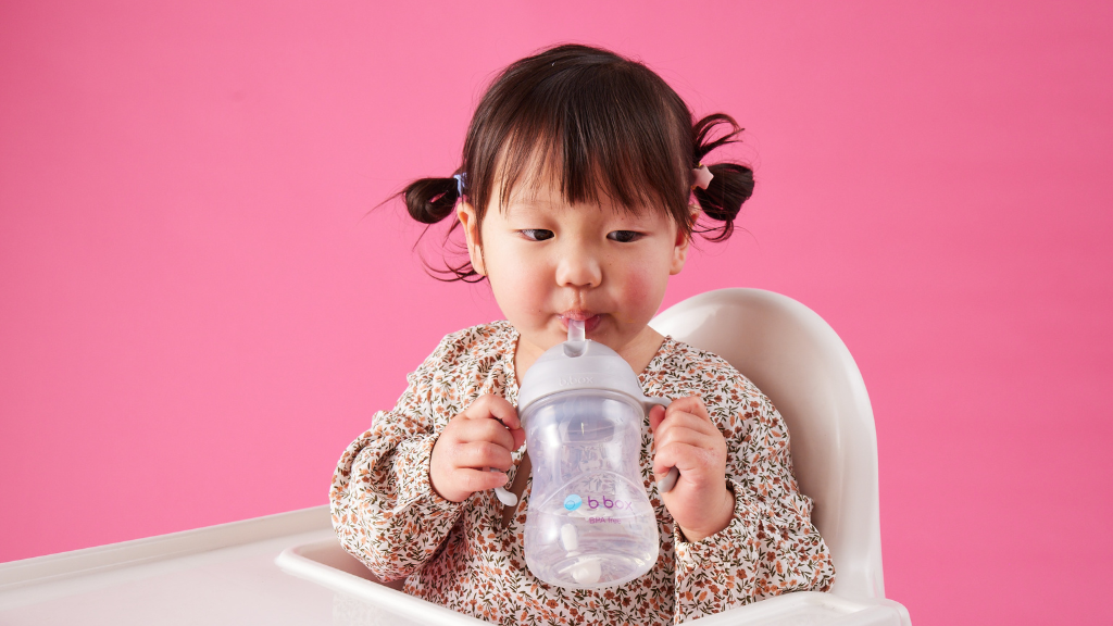 kid staying hydrated with b.box sippy cup