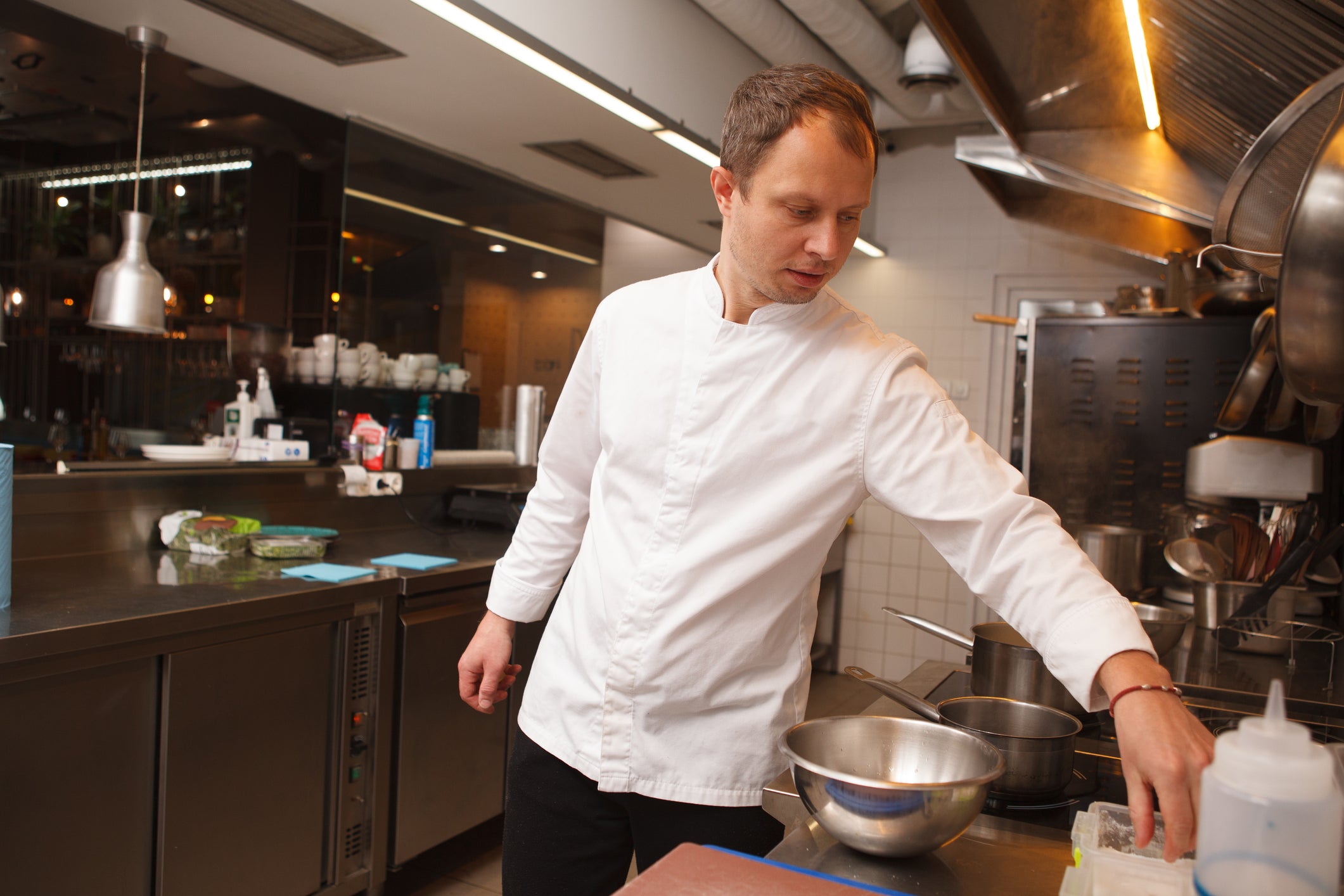 Chef using under counter fridge