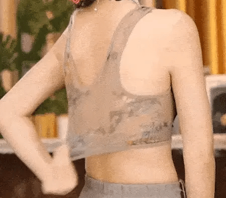 woman streching the bra GIF 2