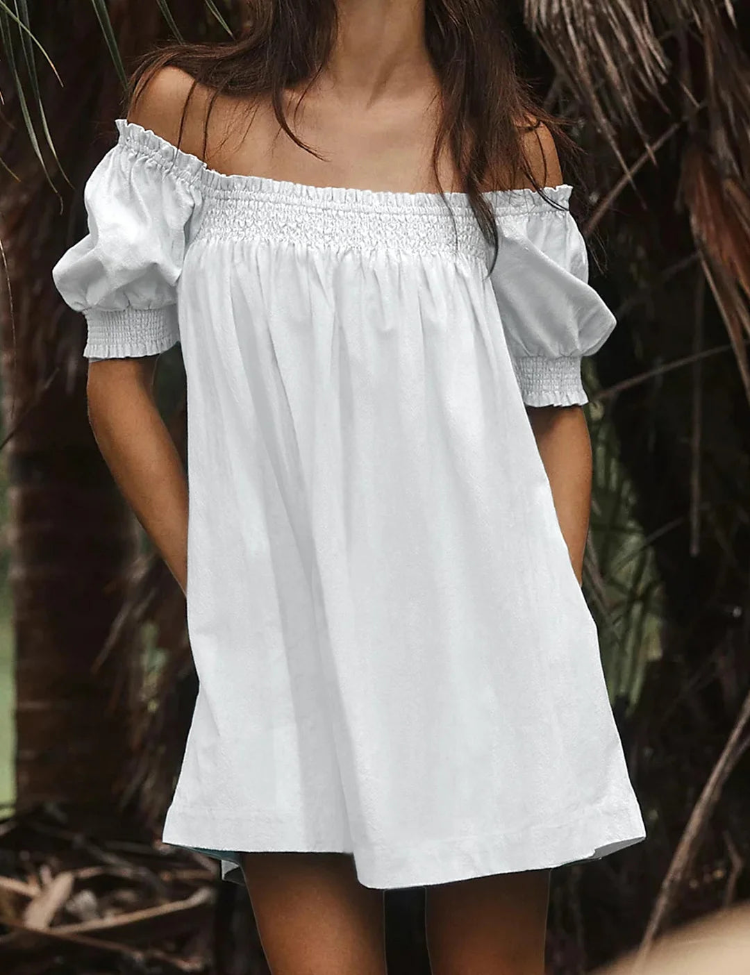Showing the off the shoulder fit of Riley