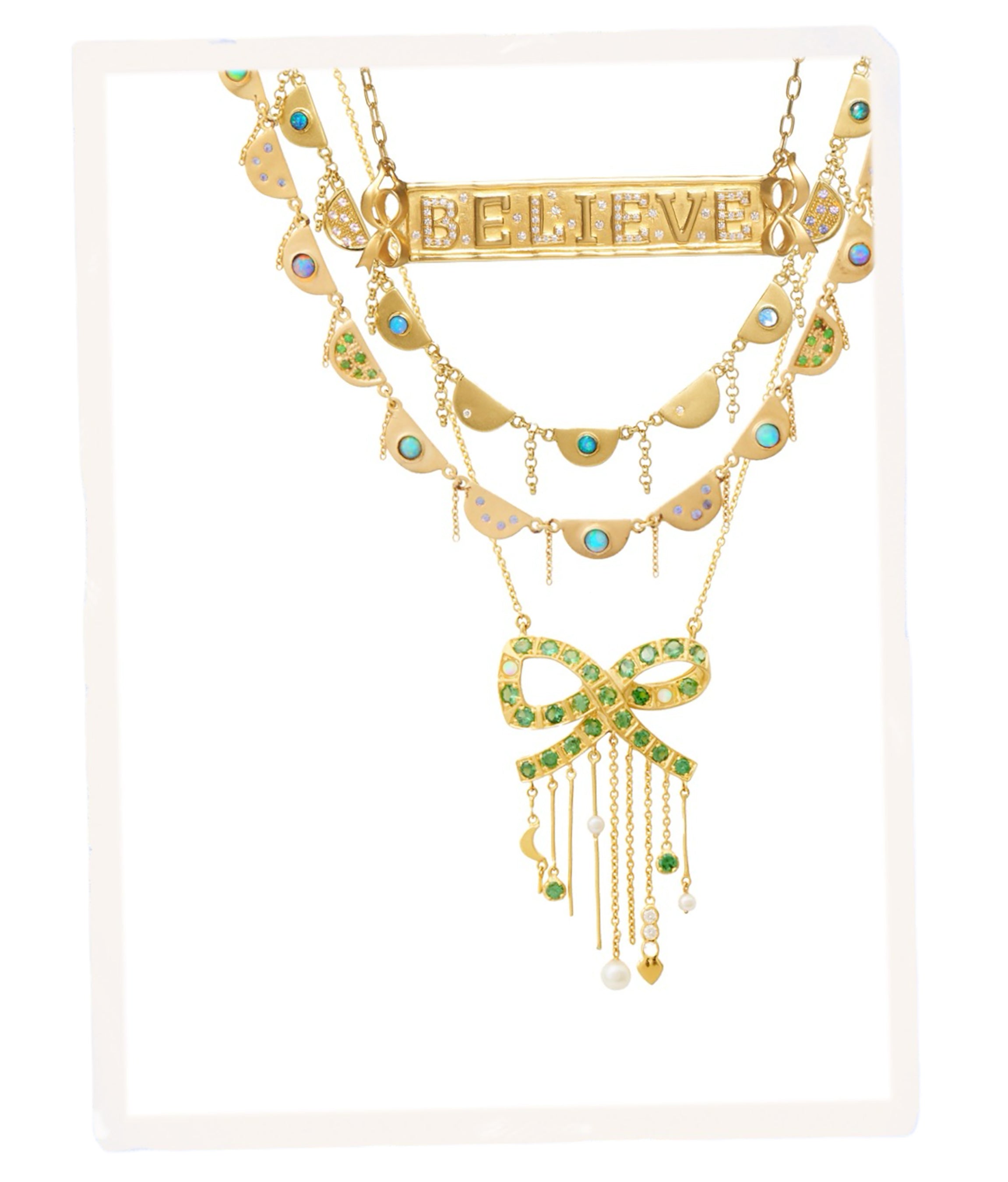 Unhada jewelry layered necklaces -Chantal in 18k yellow gold with tanzanite, opal, emerald. Tsavorite, gold bow necklace with pearls and opals. Pavé diamond believe nameplate necklace with bows.