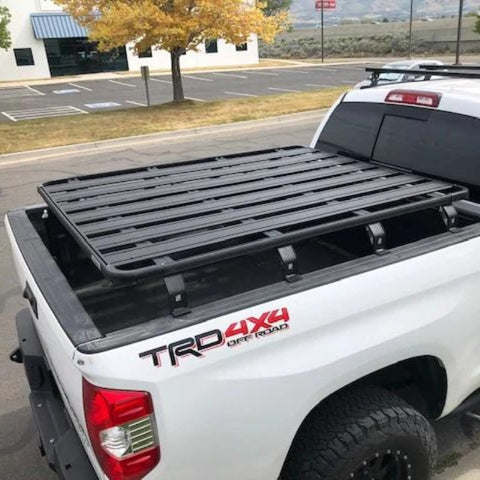 eezi-awn-k9-bed-rack-for-toyota-tundra-side-view-of-vehicle-in-parking-lot