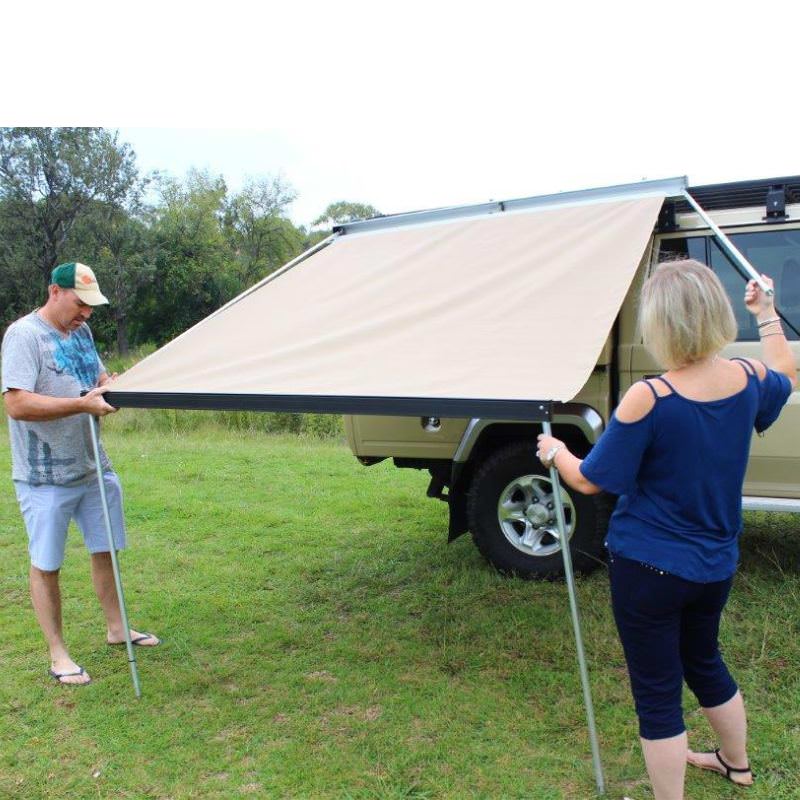 eezi-awn-series-1000-awning-beige-open-side-view-silver-hardcase-with-persons-on-land-cruiser-in-nature