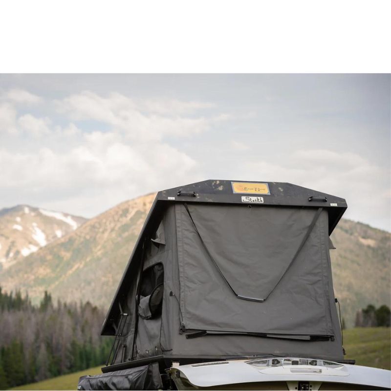 eezi-awn-stealth-hard-shell-roof-top-tent-open-rear-view-on-ford-explorer-in-the-outdoors