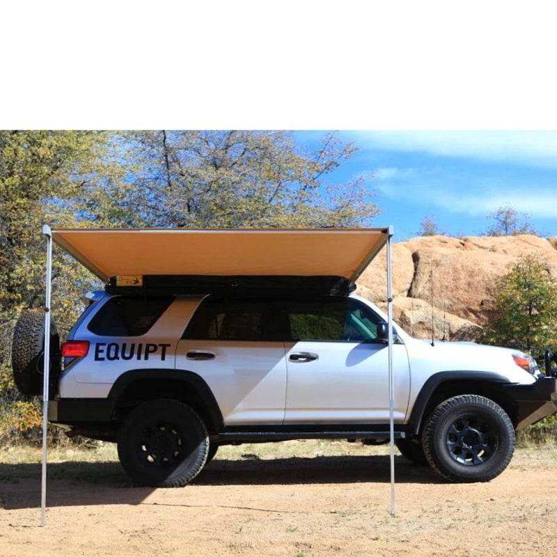 eezi-awn-swift-awning-beige-open-rear-side-veiw-on-toyota-4runner-in-terrain