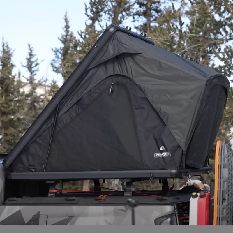 freespirit-recreation-aspen-lite-hard-shell-roof-top-tent-black-open-side-view-on-truck-in-nature