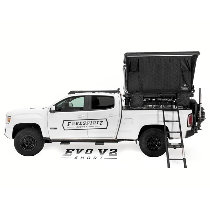 freespirit-recreation-evolution-v-2-hard-shell-tent-with-black-top-short-white-gmc-truck-side-view-closed-door-with-attached-ladder