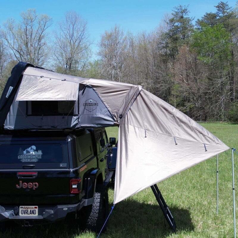 overland-vehicle-systems-bushveld-awning-fitted-to-bushveld-hard-shell-roof-top-tent-on-jeep-gladiator-rear-view