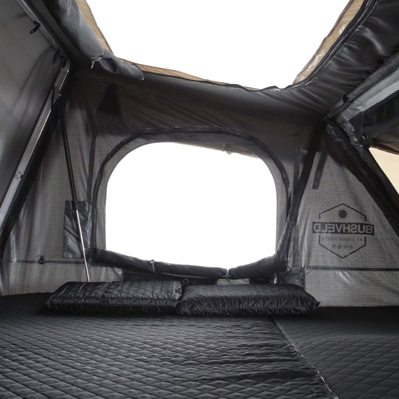 overland-vehicle-systems-bushveld-hard-shell-roof-top-tent-interior-view-of-quilted-memory-foam-mattress