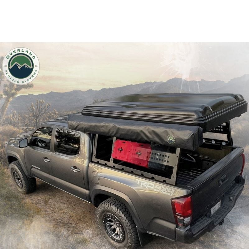 overland-vehicle-systems-discovery-rack-side-view-on-toyota-tacoma-with-roof-top-tent-and-awning