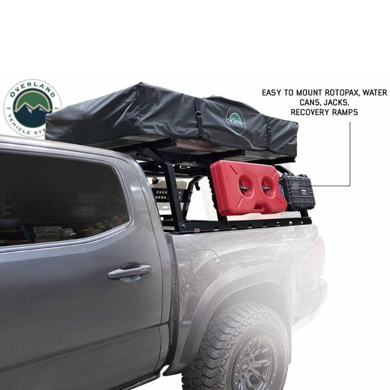 overland-vehicle-systems-discovery-rack-side-view-on-toyota-tacoma-with-rotopax-and-recovery-equipment