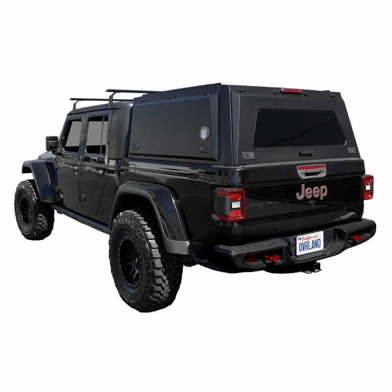 overland-vehicle-systems-expedition-truck-cap-for-jeep-gladiator-black-closed-rear-corner-view-on-neutral-background