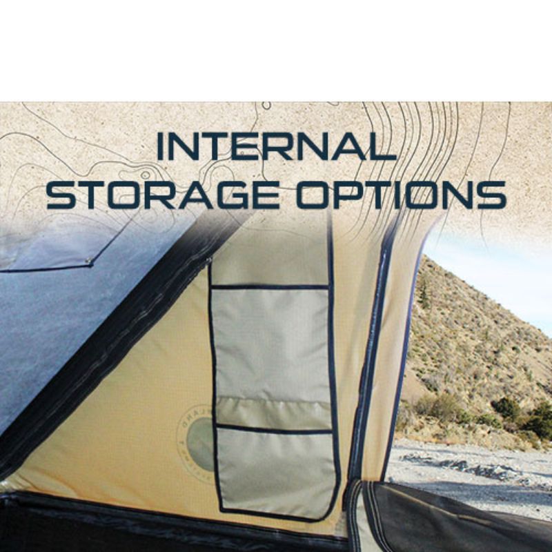 overland-vehicle-systems-ld-tmon-clamshell-aluminum-hard-shell-roof-top-tent-tan-interior-view-with-internal-storage