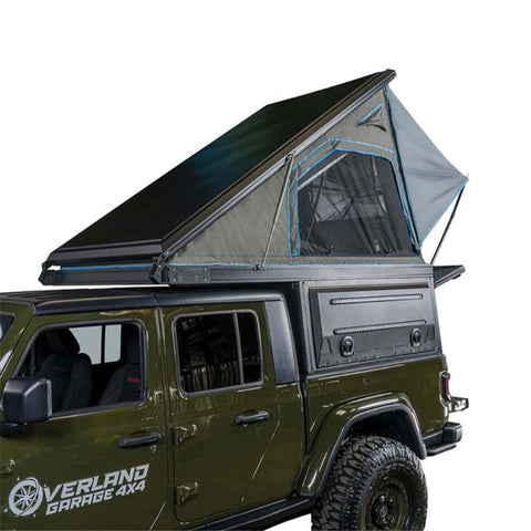 overland-vehicle-systems-magpak-truck-camper-for-jeep-gladiator-open-front-corner-view-on-white-backgound