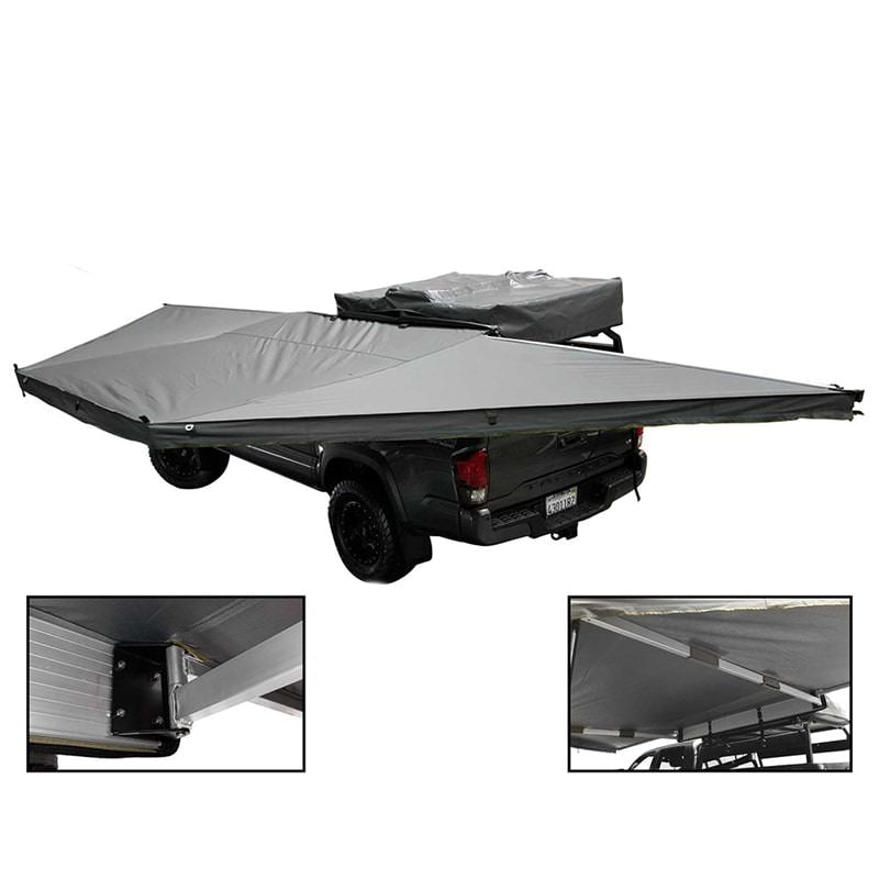 overland-vehicle-systems-nomadic-awning-180-with-zip-in-wall-open-drone-view-on-toyota-tacoma-with-close-up-view-images-of-hinges-and-velcro-fitting